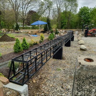 This bridge, with only 3 of the 6, ten-foot spans in position (a total of 60 feet!), will be one of the first things people will see!